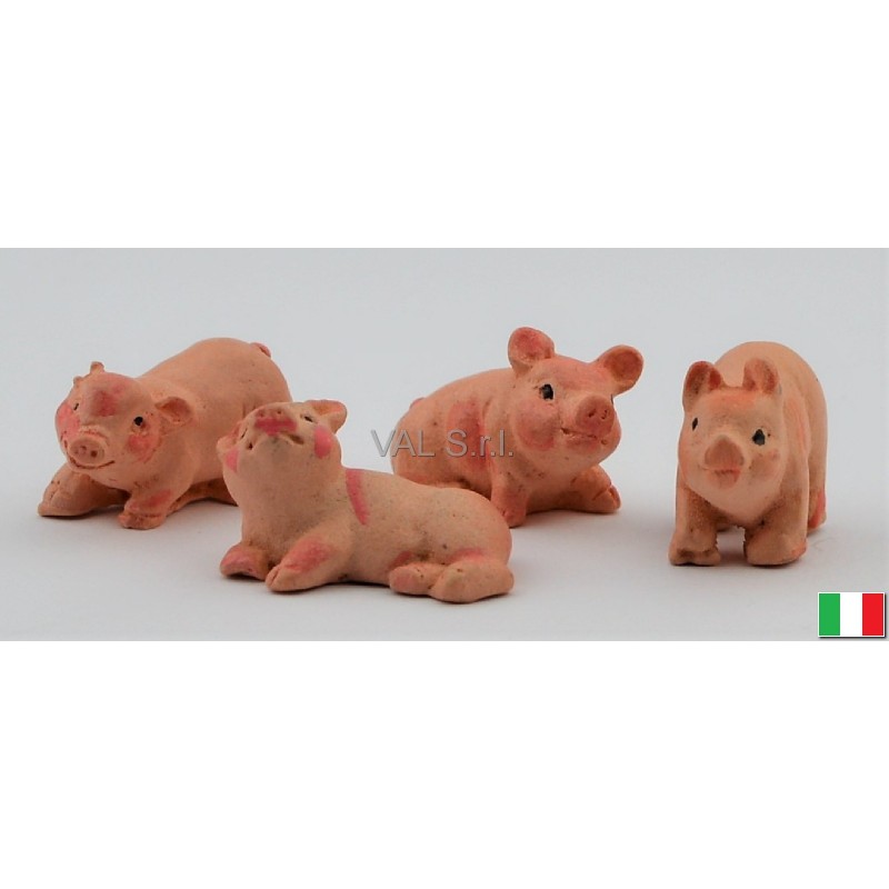 Set composed by 4 terracotta pigs cm. 2
