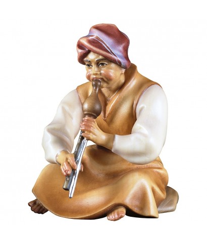 Seated shepherd with flute