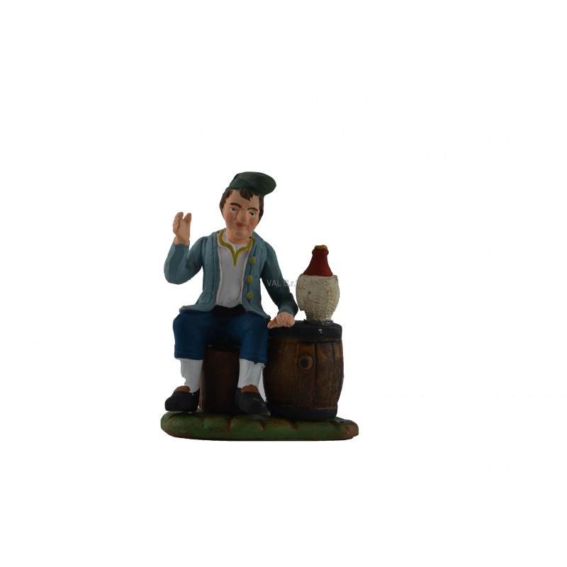 Seated man with painted terracotta wine barrel cm 10