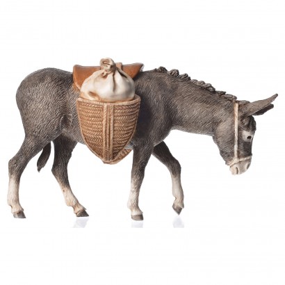 Donkey with saddle standing...